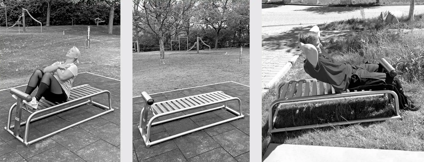 trainierende Frau, Fitnessgerät Bauchtrainer, trainierender Mann